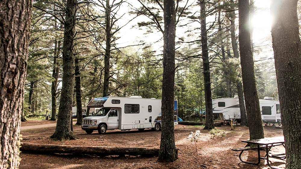 Two campers parked after receiving thorough rv inspection services